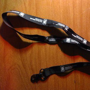 NIU Northern Illinois University black lanyard with plastic clip